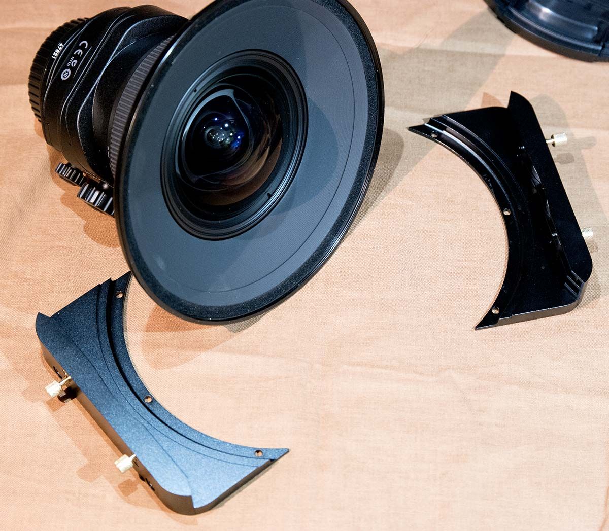 IMAGE: http://i89.photobucket.com/albums/k220/jeffreybehr/Samsung%20NX1/17mm%20TS-E%20lens%20and%20Fotodiox%20WonderPana%20filter/17TSE%20front%20w%20Fotodiox%20ring%20amp%20wings_1200w_zpst1p4yfvq.jpg