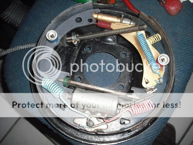 How to remove parking brake from rear drums?...